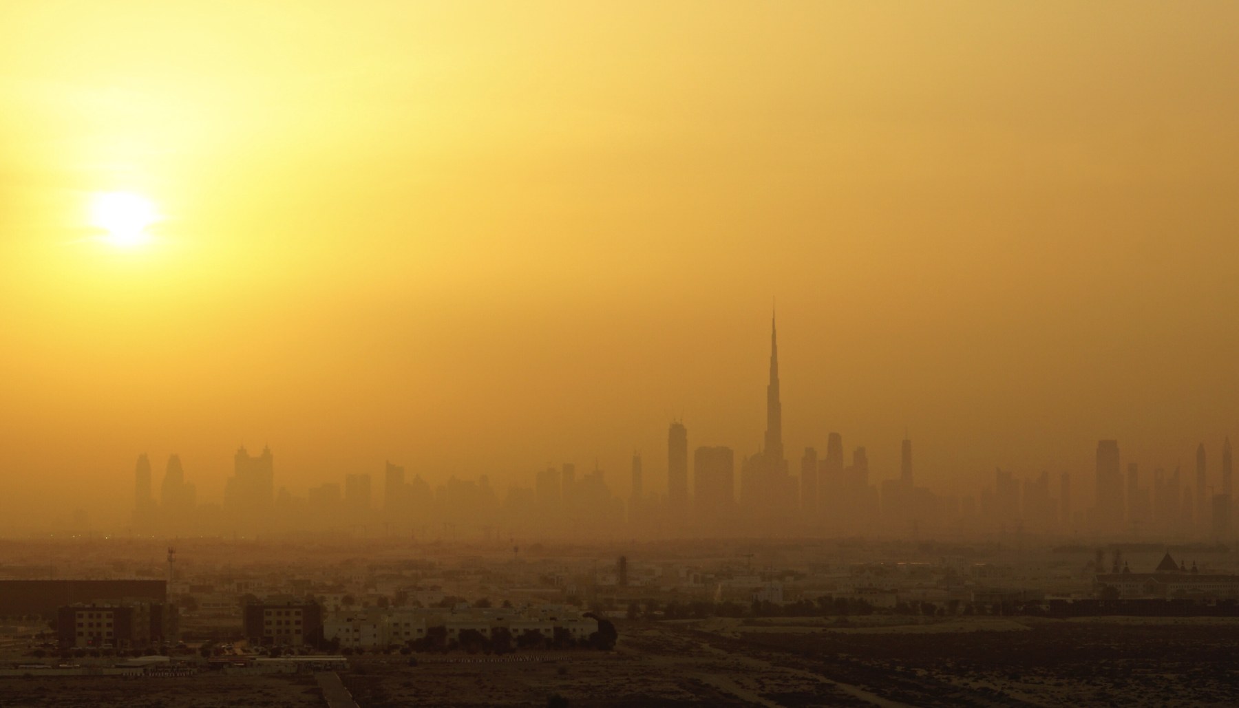 Dubai skyline and Burj Khalifa at sunset